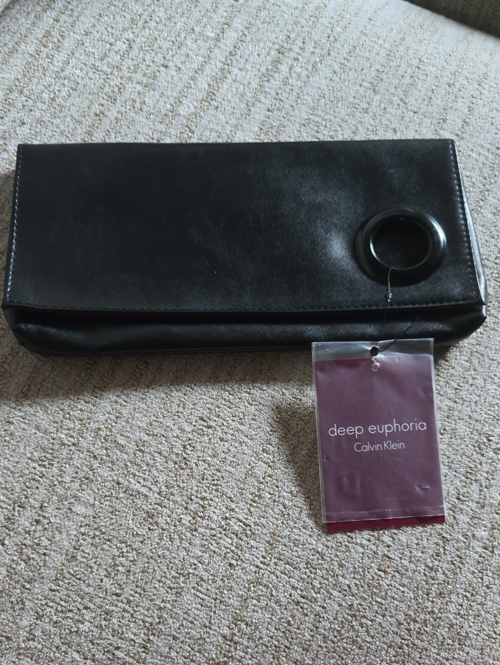 Calvin Klein Black Leather Fold-Over Clutch with Ring Accent